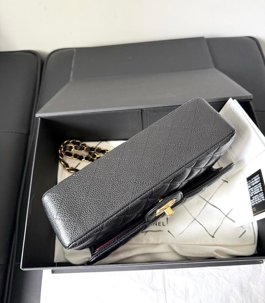 Chanel Small Classic Flap Black Caviar leather with Gold Hardware