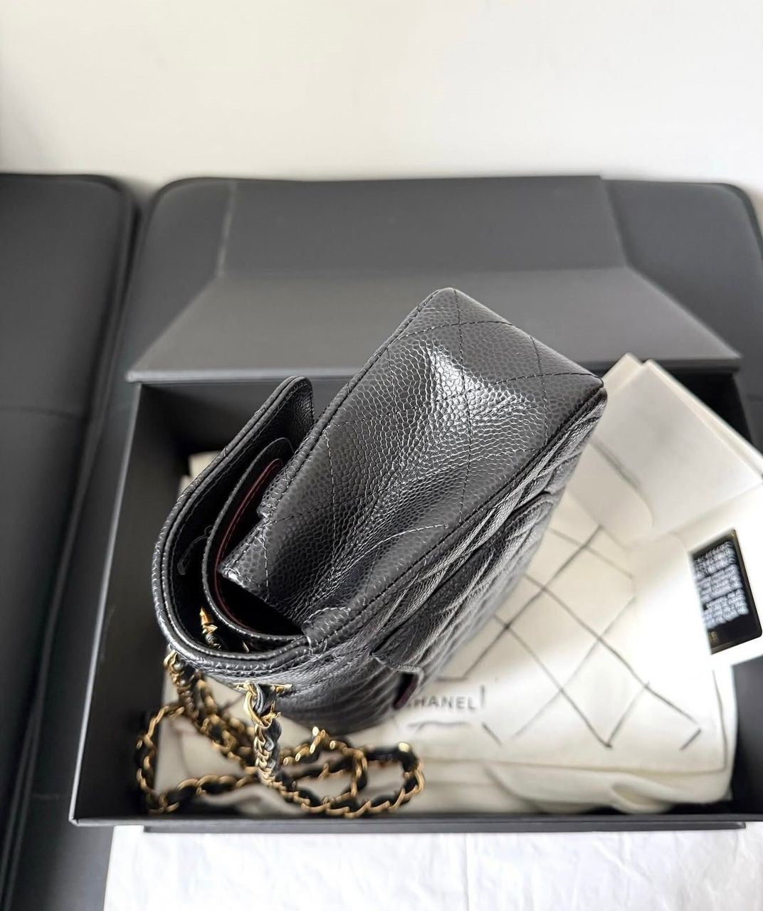 Chanel Small Classic Flap Black Caviar leather with Gold Hardware