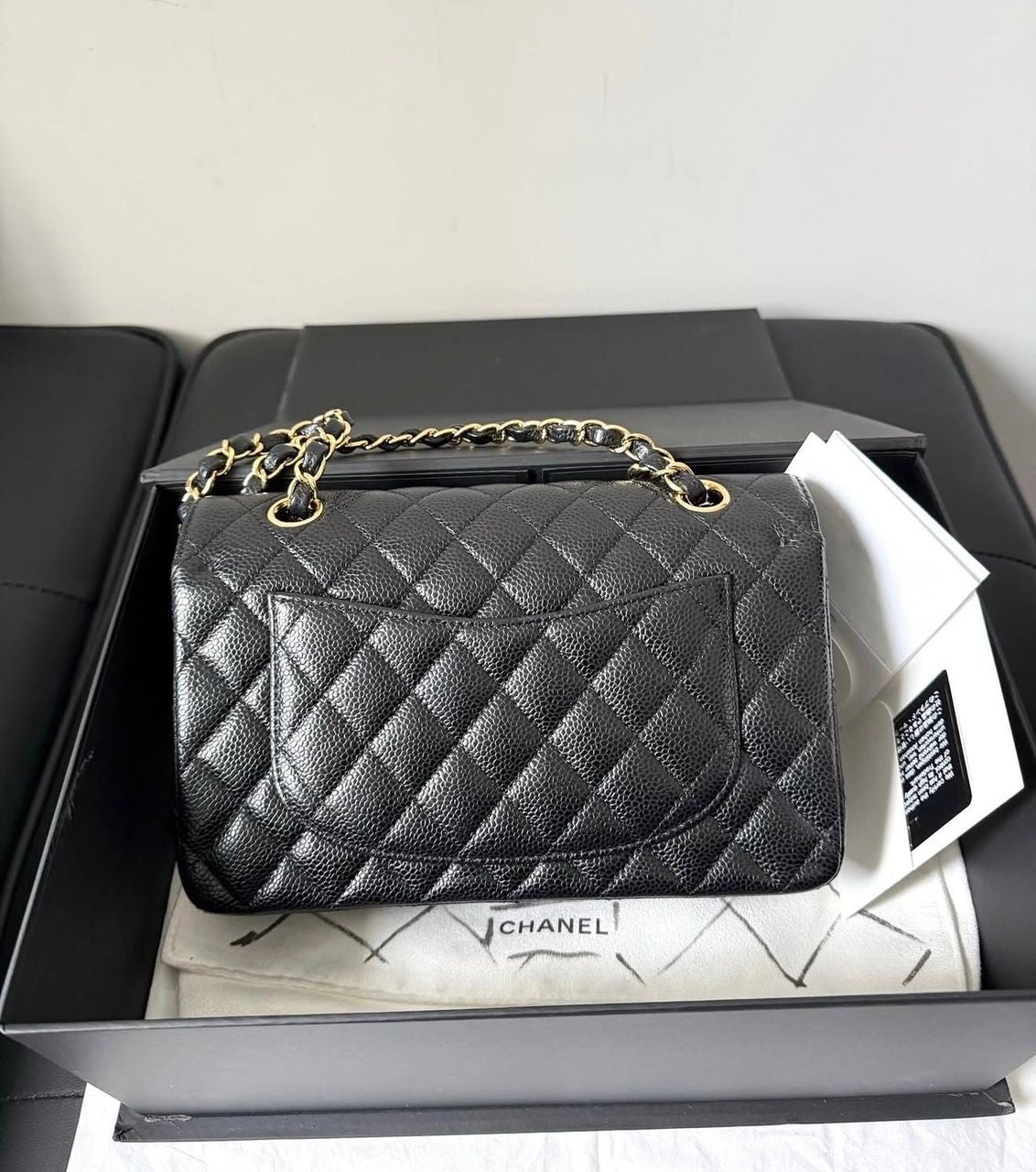 Chanel Small Classic Flap Black Caviar leather with Gold Hardware