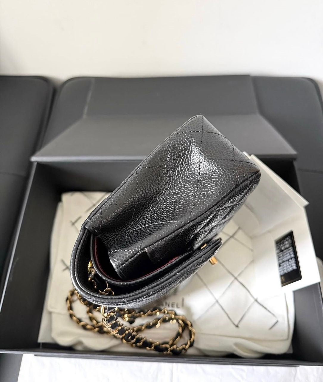 Chanel Small Classic Flap Black Caviar leather with Gold Hardware
