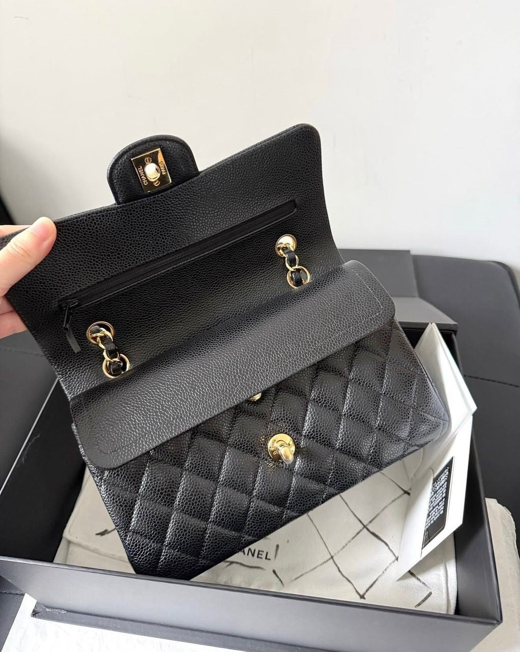 Chanel Small Classic Flap Black Caviar leather with Gold Hardware